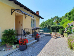 Villa with enchanting garden overlooking the lake Luino